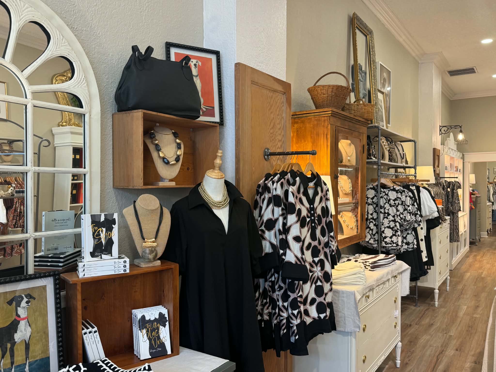 Interior of Grace and Gray Mercantile showing clothing, books, and jewelry displays